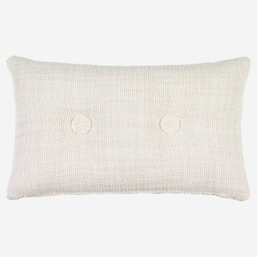 Coussin 30x50cm en tissu tressé blanc et boutons