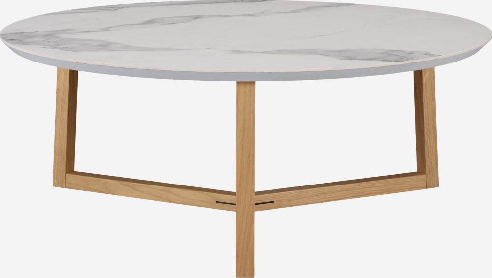 Table basse ronde en céramique avec effet marbre