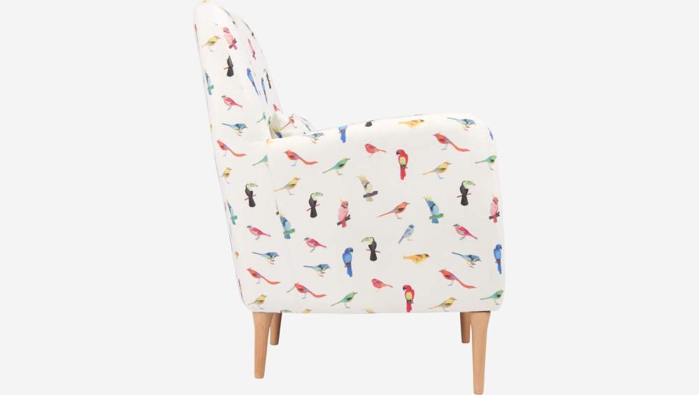 Fauteuil en tissu motif oiseaux et pieds en chêne