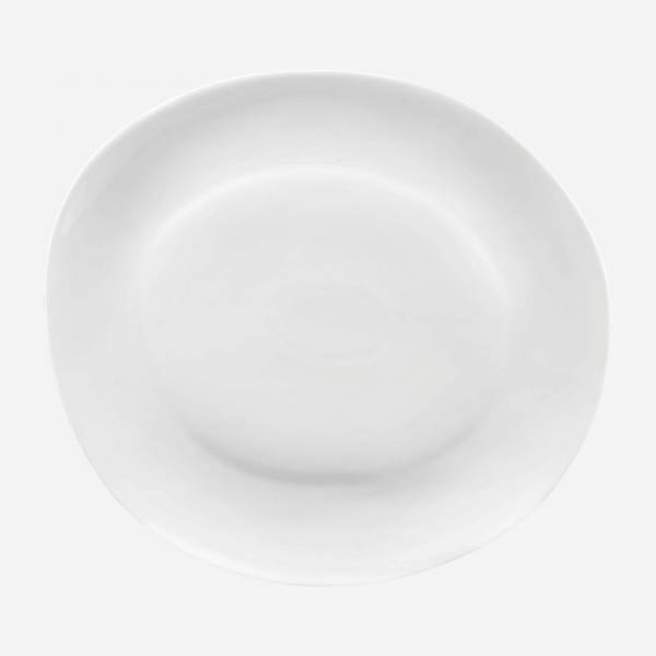 Assiette plate en porcelaine de Limoges