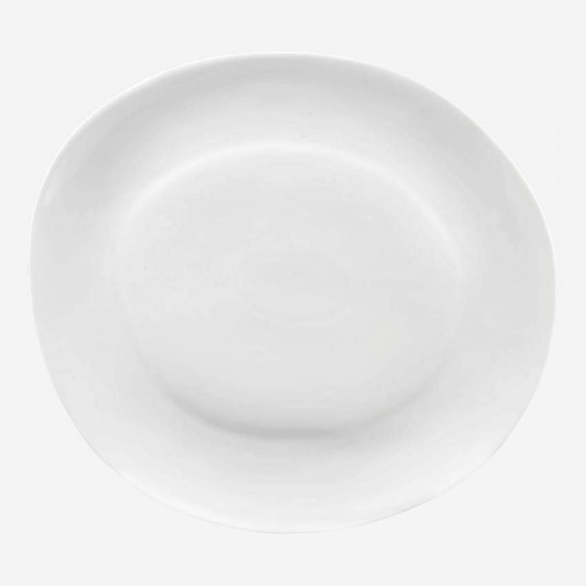 Assiette plate en porcelaine de Limoges