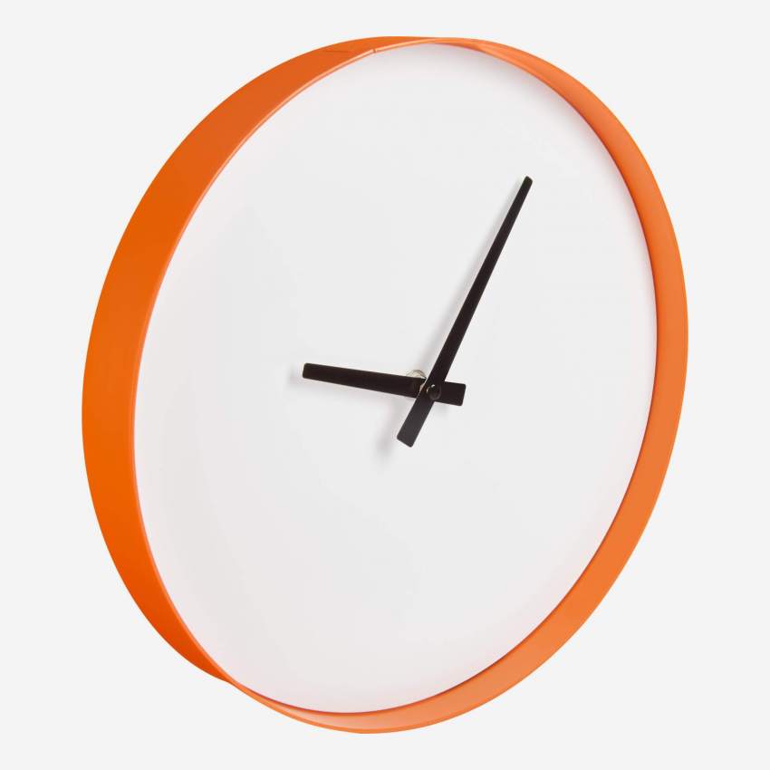 Horloge murale en métal orange
