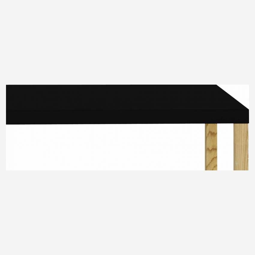 Table rectangulaire en acier laqué noir et pieds en chêne