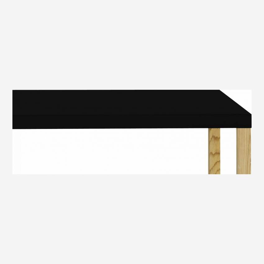 Table rectangulaire en acier laqué noir et pieds en chêne