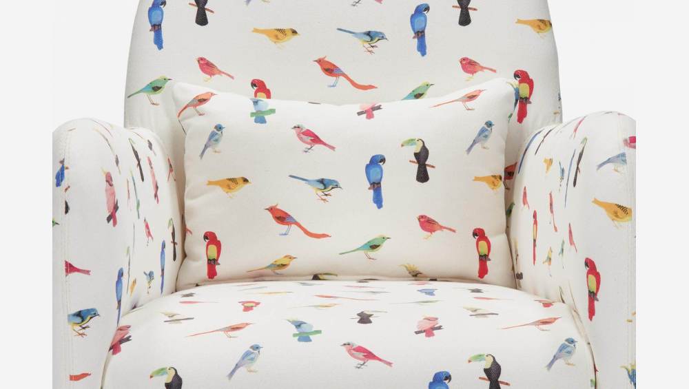 Fauteuil en tissu motif oiseaux et pieds en chêne