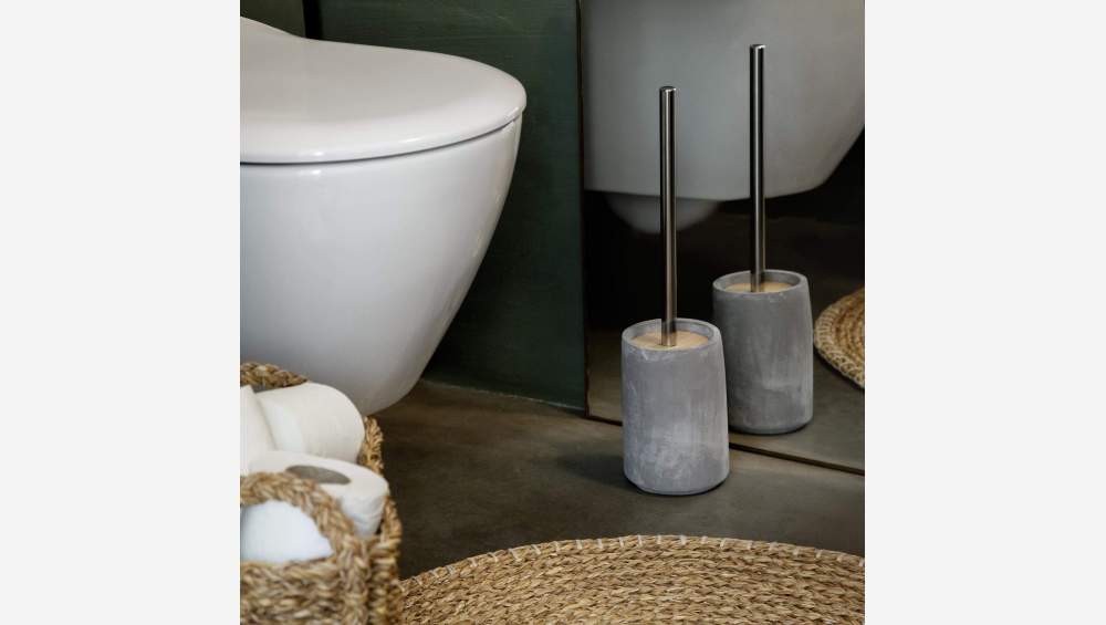 Toiletborstel van beton, hout en metaal