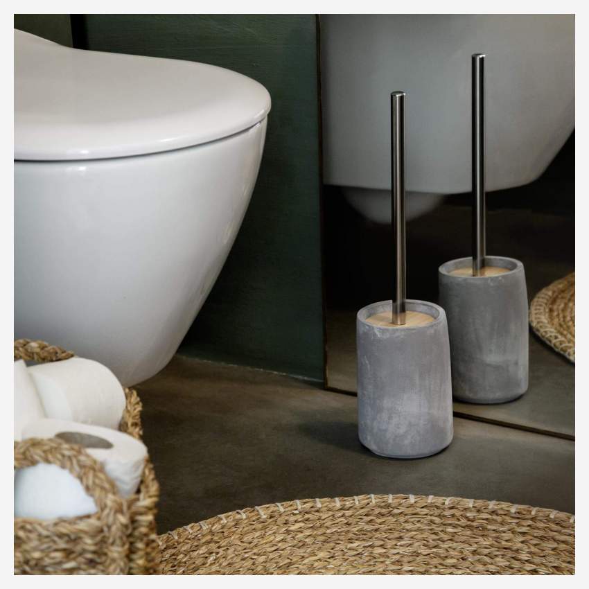 Toiletborstel van beton, hout en metaal