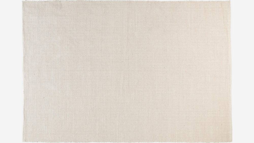 Plat geweven tapijt 120x180 cm van beige katoen